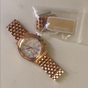 Rose gold watch with extra links